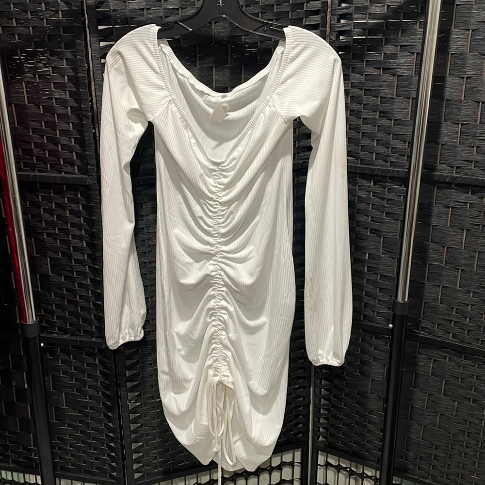 White ribbed cinch front long sleeve dress with puffy cinch sleeves droop neck